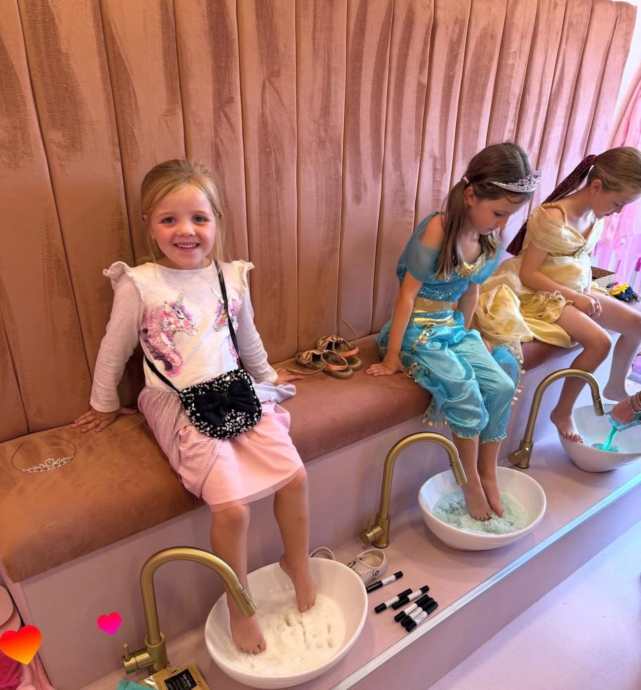 Princesses enjoying a foot spa soak